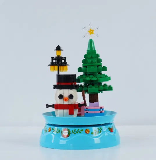 Woma Toys Großhandel Anpassen Kinder Weihnachten Geburtstagsgeschenke Schneemann Modell Sammeln Spin Spieluhr DIY Kleine Ziegel Bausteine ​​Set DIY Spiel Spielzeug